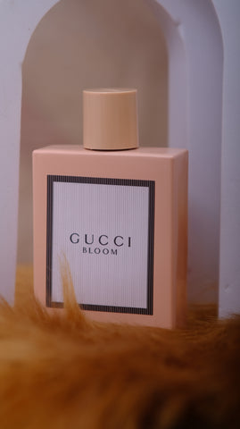Gucci Bloom perfume bottle on a white background